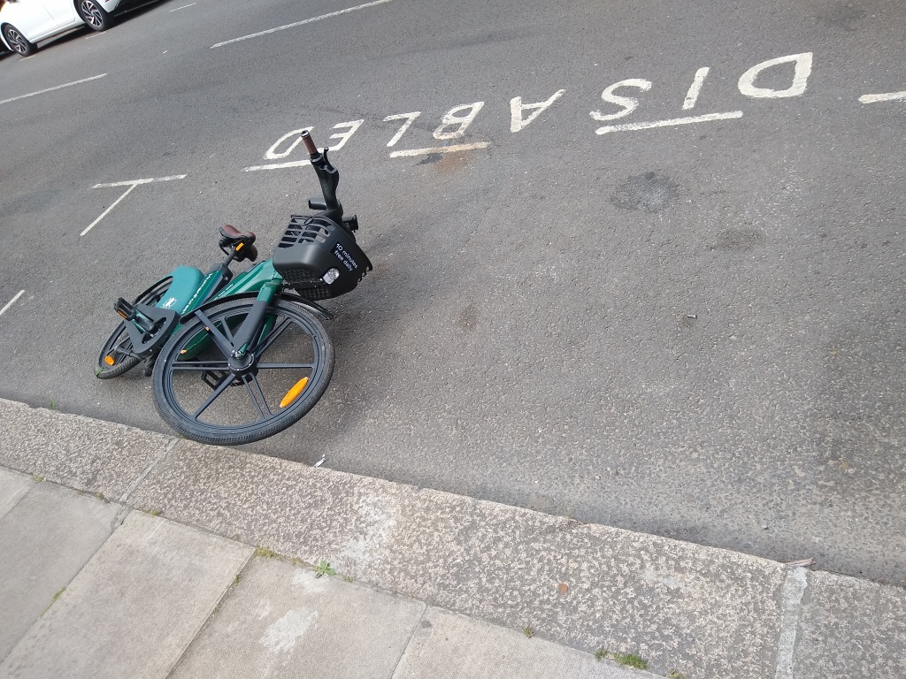 ebike dumped in a disabled parking bay